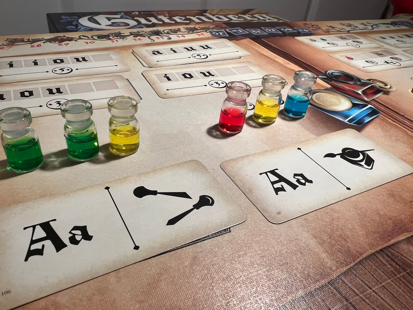 Gutenberg ink bottles (board game tokens)