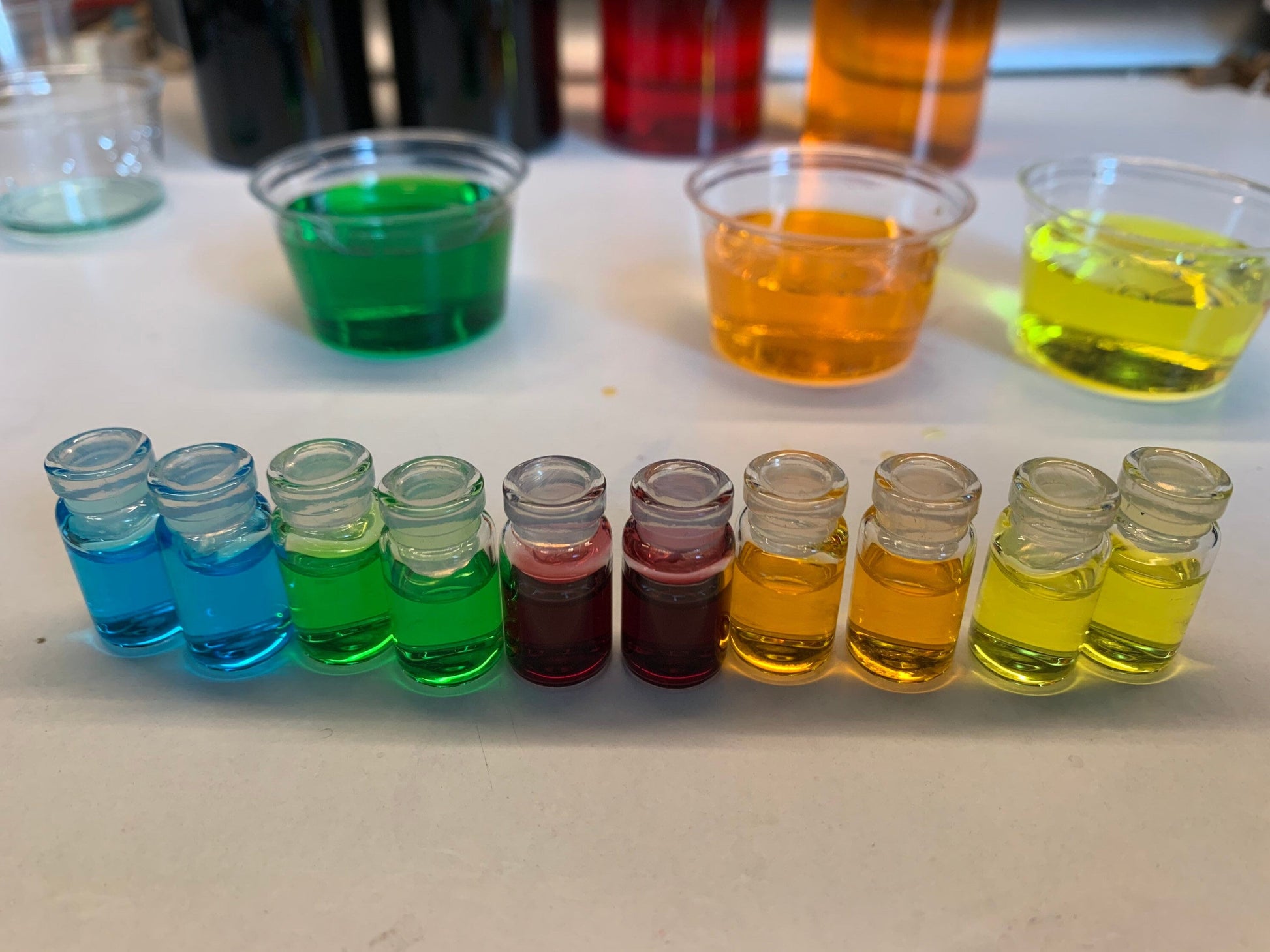 Multiple colors of water in tiny bottles